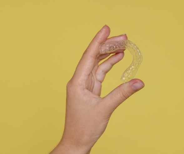 Invisalign clear aligner tray at Promenade Village Dental